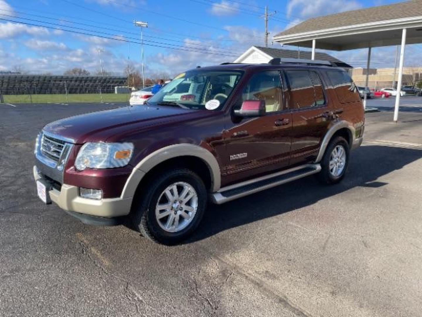 2007 Dark Cherry Metallic Ford Explorer Eddie Bauer 4.0L 4WD (1FMEU74E77U) with an 4.0L V6 SOHC 16V engine, 5-Speed Automatic transmission, located at 4508 South Dixie Dr, Moraine, OH, 45439, (937) 908-9800, 39.689976, -84.218452 - Photo#1