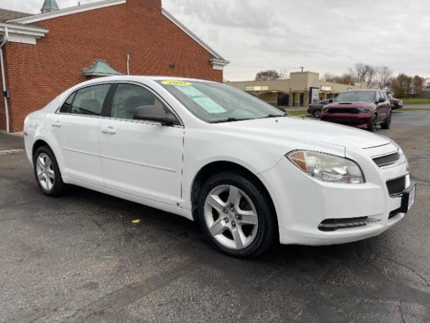 2009 Summit White Chevrolet Malibu LS (1G1ZG57B69F) with an 2.4L L4 DOHC 16V engine, 4-Speed Automatic transmission, located at 1230 East Main St, Xenia, OH, 45385, (937) 908-9800, 39.688026, -83.910172 - Photo#0