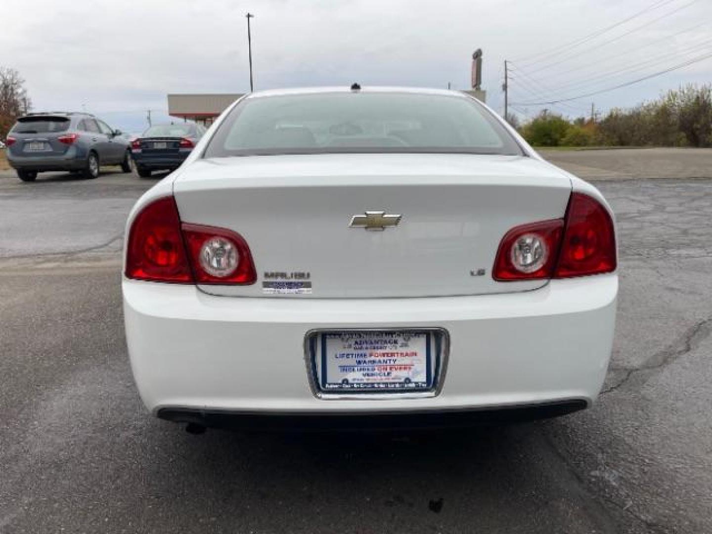 2009 Summit White Chevrolet Malibu LS (1G1ZG57B69F) with an 2.4L L4 DOHC 16V engine, 4-Speed Automatic transmission, located at 1230 East Main St, Xenia, OH, 45385, (937) 908-9800, 39.688026, -83.910172 - Photo#5