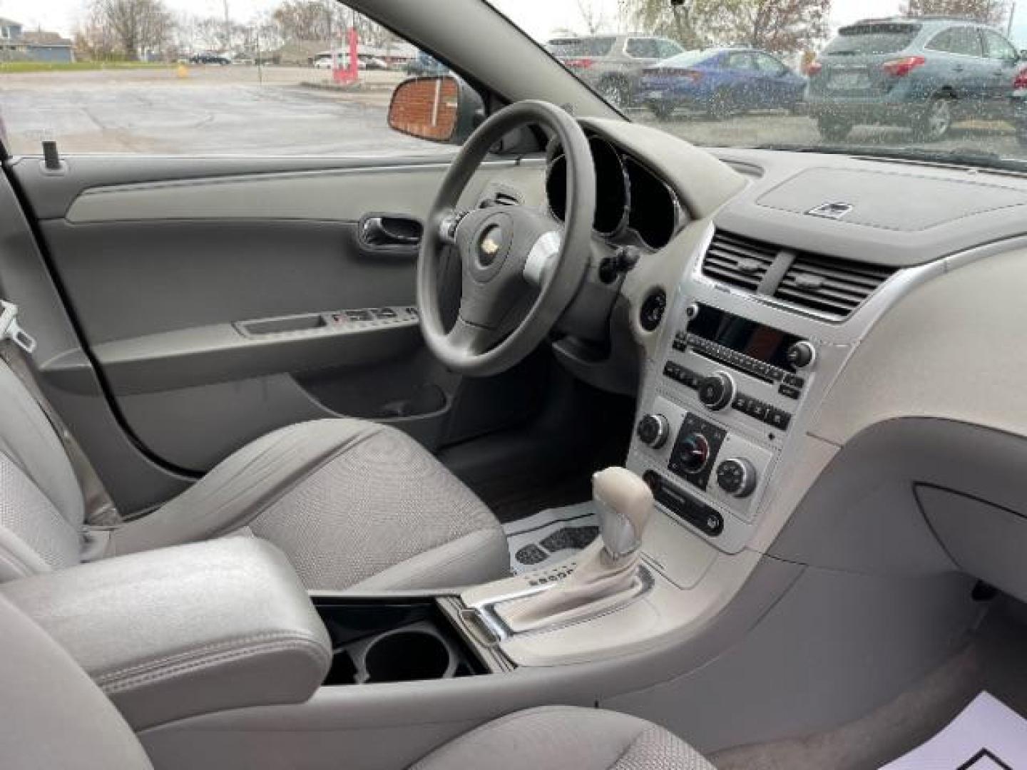 2009 Summit White Chevrolet Malibu LS (1G1ZG57B69F) with an 2.4L L4 DOHC 16V engine, 4-Speed Automatic transmission, located at 1230 East Main St, Xenia, OH, 45385, (937) 908-9800, 39.688026, -83.910172 - Photo#7