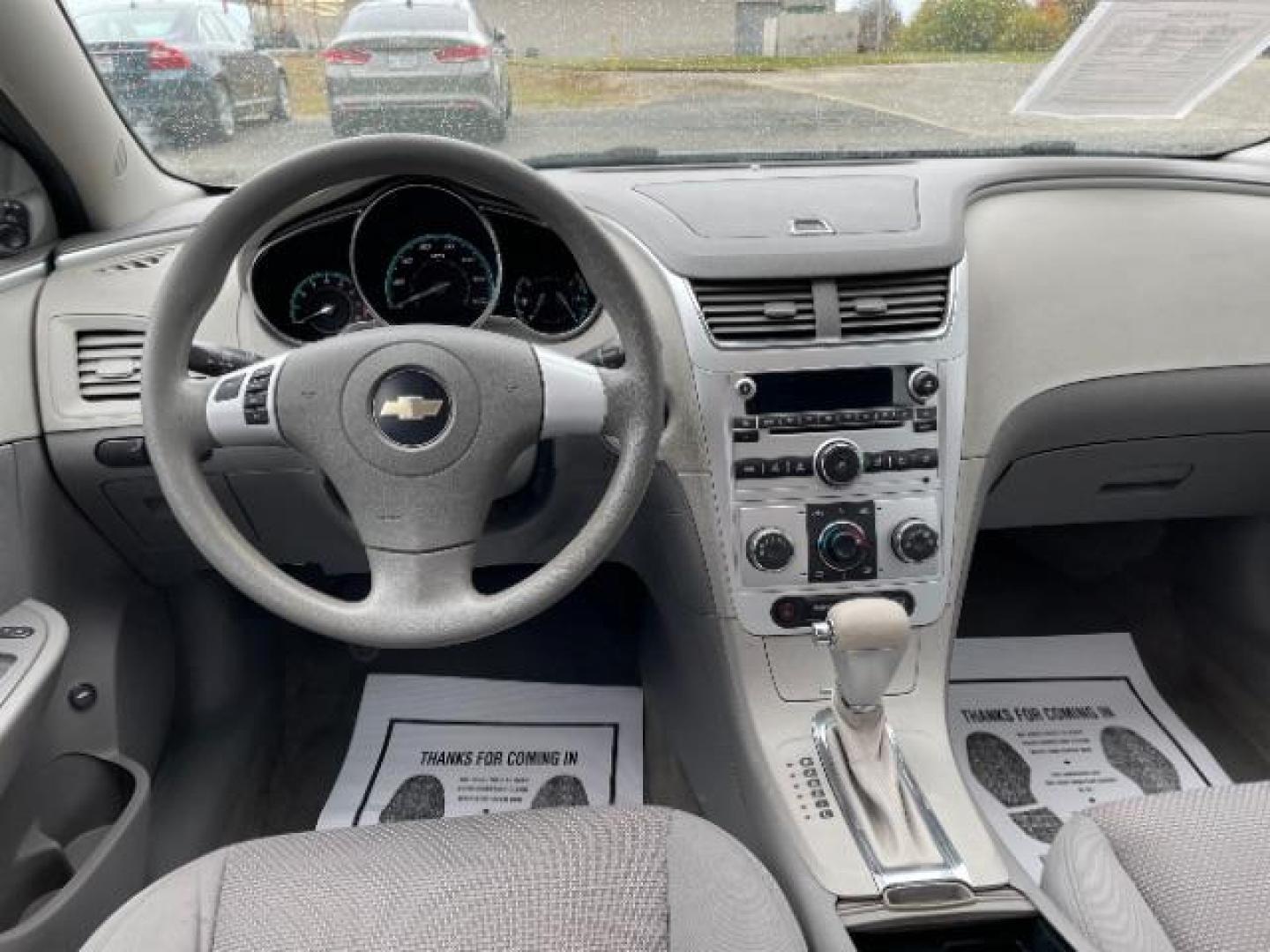 2009 Summit White Chevrolet Malibu LS (1G1ZG57B69F) with an 2.4L L4 DOHC 16V engine, 4-Speed Automatic transmission, located at 1230 East Main St, Xenia, OH, 45385, (937) 908-9800, 39.688026, -83.910172 - Photo#8