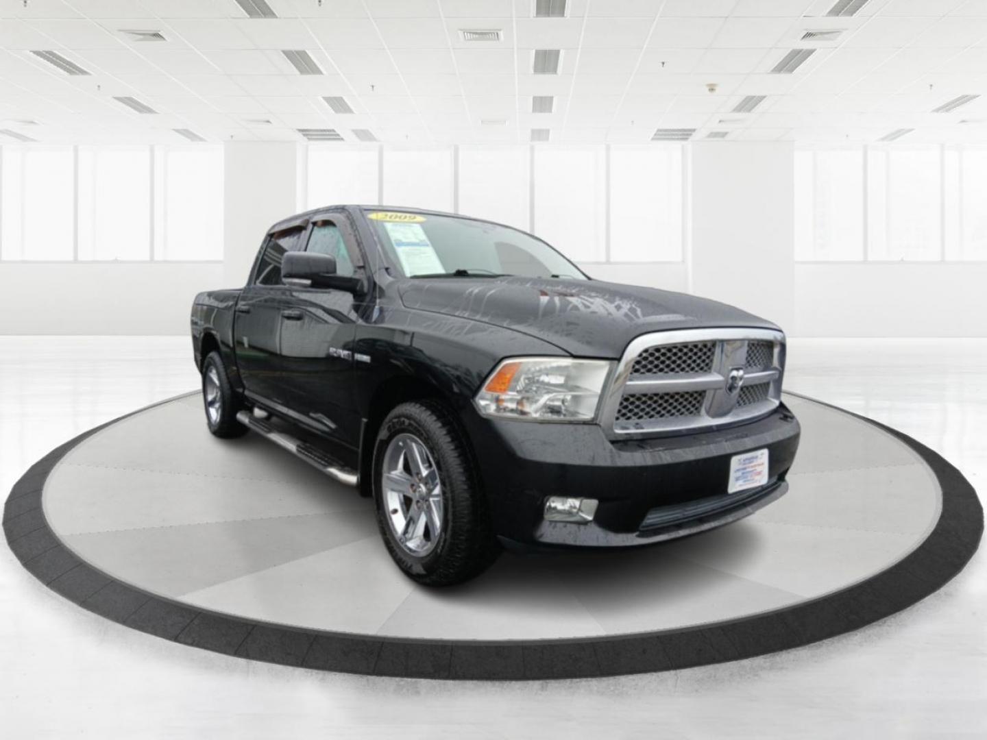 2009 Brilliant Black Crystal Pearl Dodge Ram 1500 SLT Crew Cab 4WD (1D3HV13T09J) with an 5.7L V8 OHV 16V engine, 5-Speed Automatic transmission, located at 1099 N County Rd 25A , Troy, OH, 45373, (937) 908-9800, 40.057079, -84.212883 - Photo#0