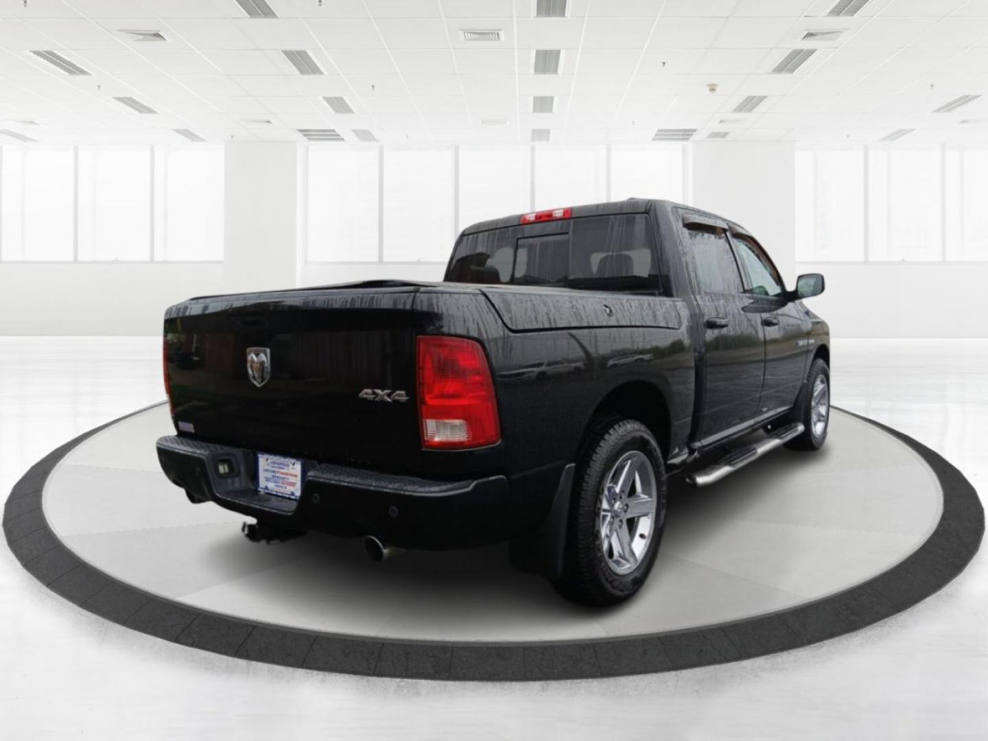 2009 Brilliant Black Crystal Pearl Dodge Ram 1500 SLT Crew Cab 4WD (1D3HV13T09J) with an 5.7L V8 OHV 16V engine, 5-Speed Automatic transmission, located at 1099 N County Rd 25A , Troy, OH, 45373, (937) 908-9800, 40.057079, -84.212883 - Photo#2