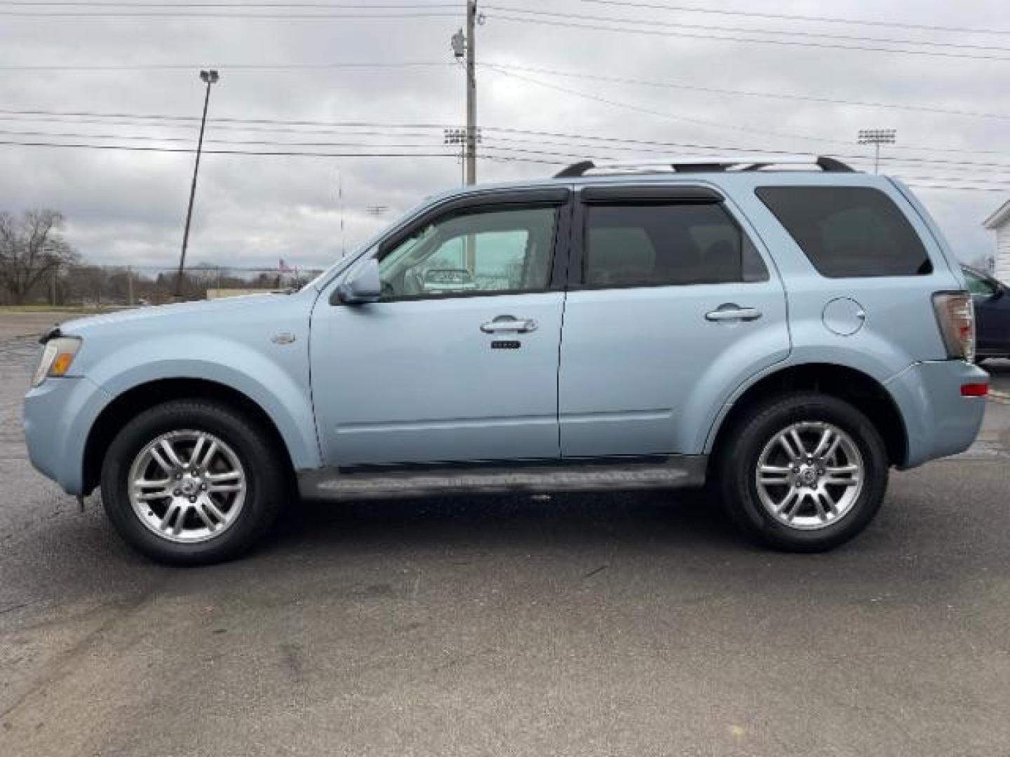 2009 Light Ice Blue Mercury Mariner Premier V6 2WD (4M2CU87G09K) , 6-Speed Automatic transmission, located at 401 Woodman Dr, Riverside, OH, 45431, (937) 908-9800, 39.760899, -84.123421 - Photo#2