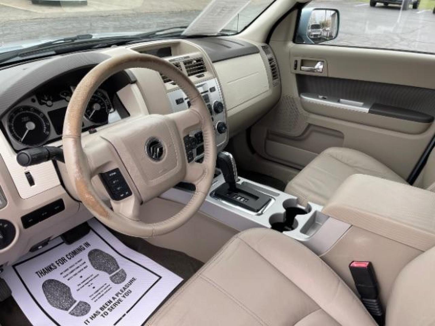 2009 Light Ice Blue Mercury Mariner Premier V6 2WD (4M2CU87G09K) , 6-Speed Automatic transmission, located at 401 Woodman Dr, Riverside, OH, 45431, (937) 908-9800, 39.760899, -84.123421 - Photo#6