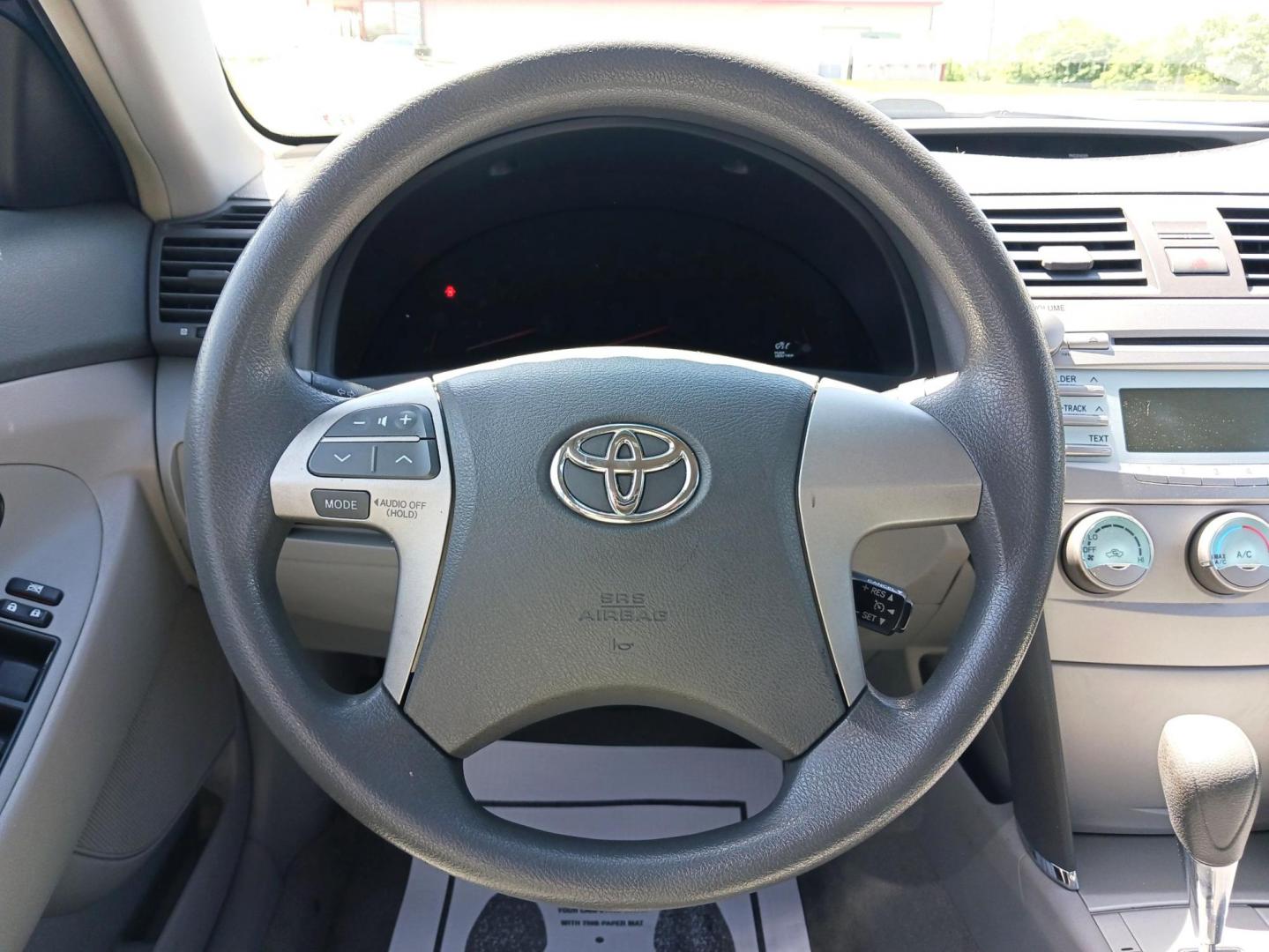 2009 Blue Ribbon Metallic Toyota Camry LE 5-Spd AT (4T4BE46K49R) with an 2.4L L4 DOHC 16V engine, 5-Speed Automatic transmission, located at 1951 S Dayton Lakeview Rd., New Carlisle, OH, 45344, (937) 908-9800, 39.890999, -84.050255 - 2009 Toyota Camry LE 5-Spd AT - Photo#15