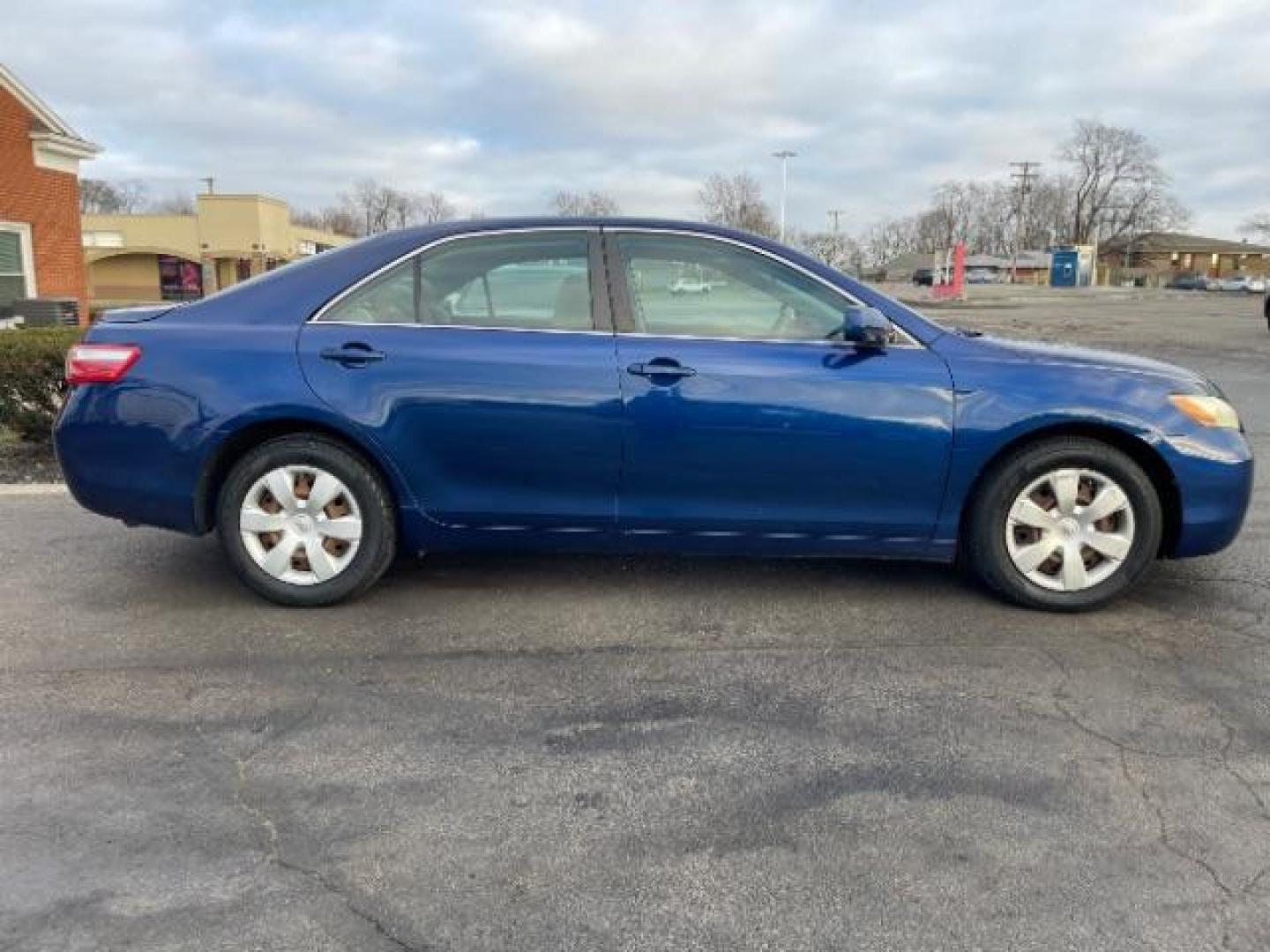 2009 Blue Ribbon Metallic Toyota Camry LE 5-Spd AT (4T4BE46K49R) with an 2.4L L4 DOHC 16V engine, 5-Speed Automatic transmission, located at 1951 S Dayton Lakeview Rd., New Carlisle, OH, 45344, (937) 908-9800, 39.890999, -84.050255 - 2009 Toyota Camry LE 5-Spd AT - Photo#21