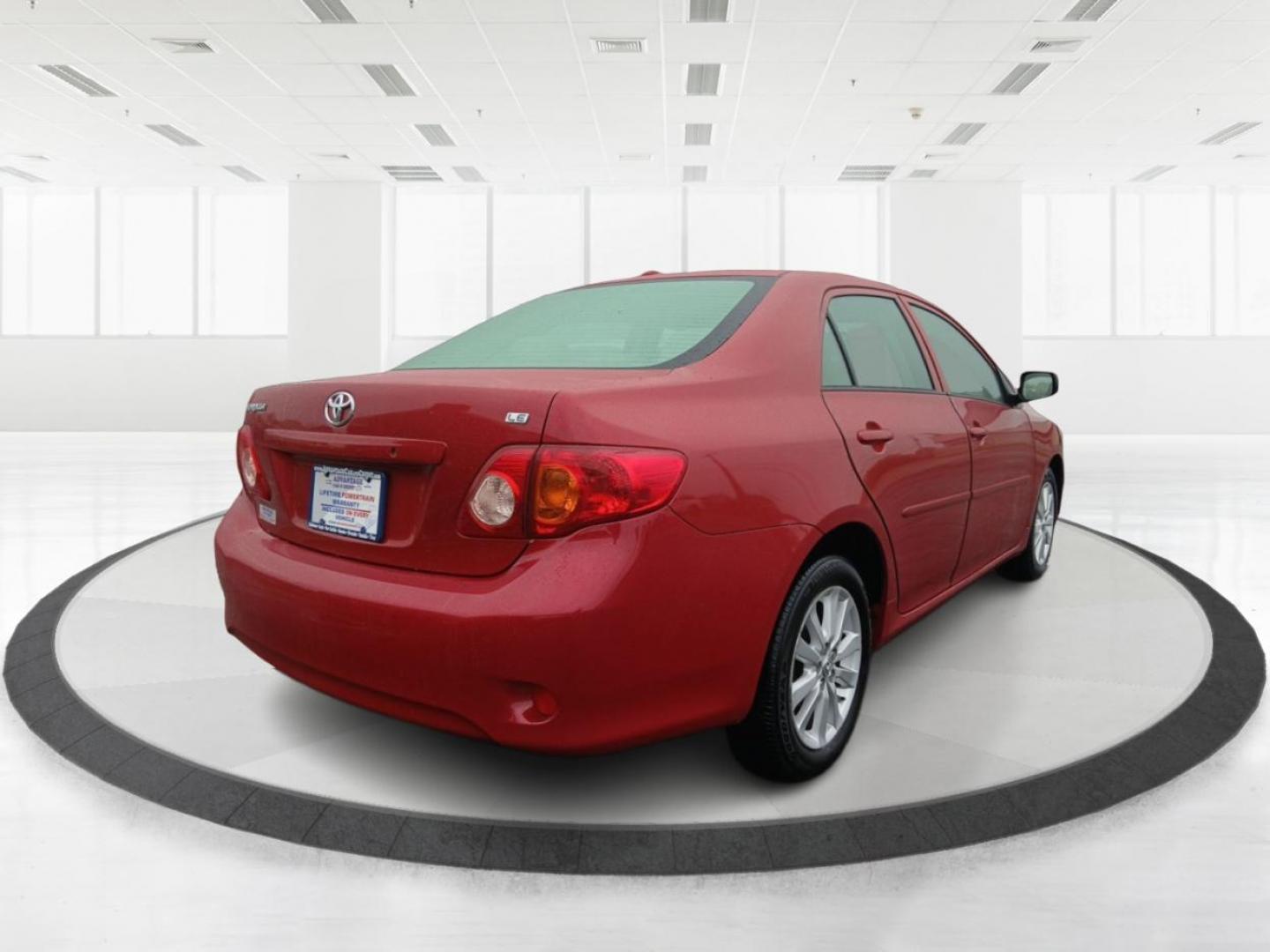 2009 Barcelona Red Metallic Toyota Corolla XRS 5-Speed AT (JTDBL40E79J) with an 1.8L L4 DOHC 16V engine, 5-Speed Automatic Overdrive transmission, located at 8750 N County Rd 25A, Piqua, OH, 45356, (937) 908-9800, 40.164391, -84.232513 - Photo#2