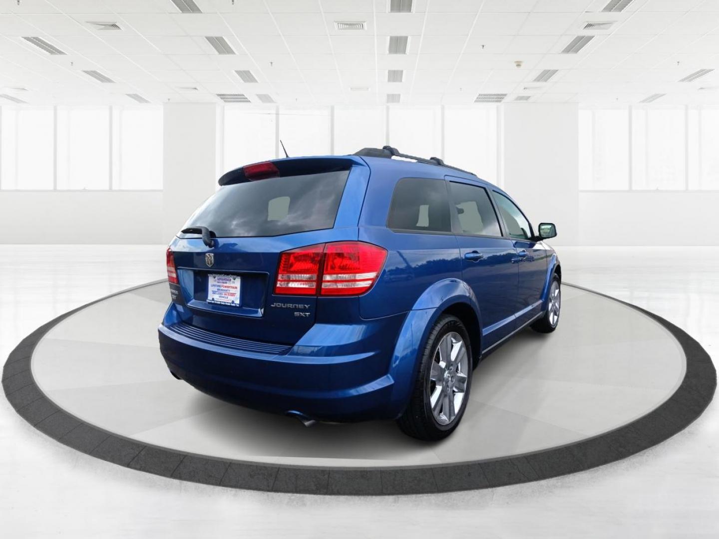 2010 Deep Water Blue Dodge Journey (3D4PH5FVXAT) with an 3.5L V6 SOHC 24V engine, 6-Speed Automatic transmission, located at 1184 Kauffman Ave, Fairborn, OH, 45324, (937) 908-9800, 39.807072, -84.030914 - Photo#2