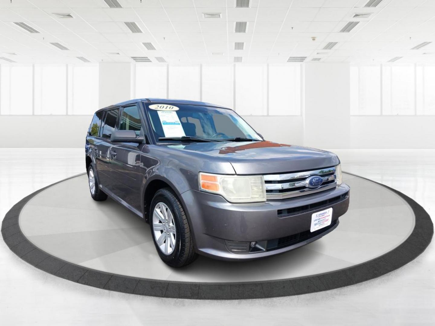 2010 Sterling Grey Metallic Ford Flex (2FMGK5BC0AB) with an 3.5L V6 DOHC 24V engine, 6-Speed Automatic Overdrive transmission, located at 1230 East Main St, Xenia, OH, 45385, (937) 908-9800, 39.688026, -83.910172 - Photo#0