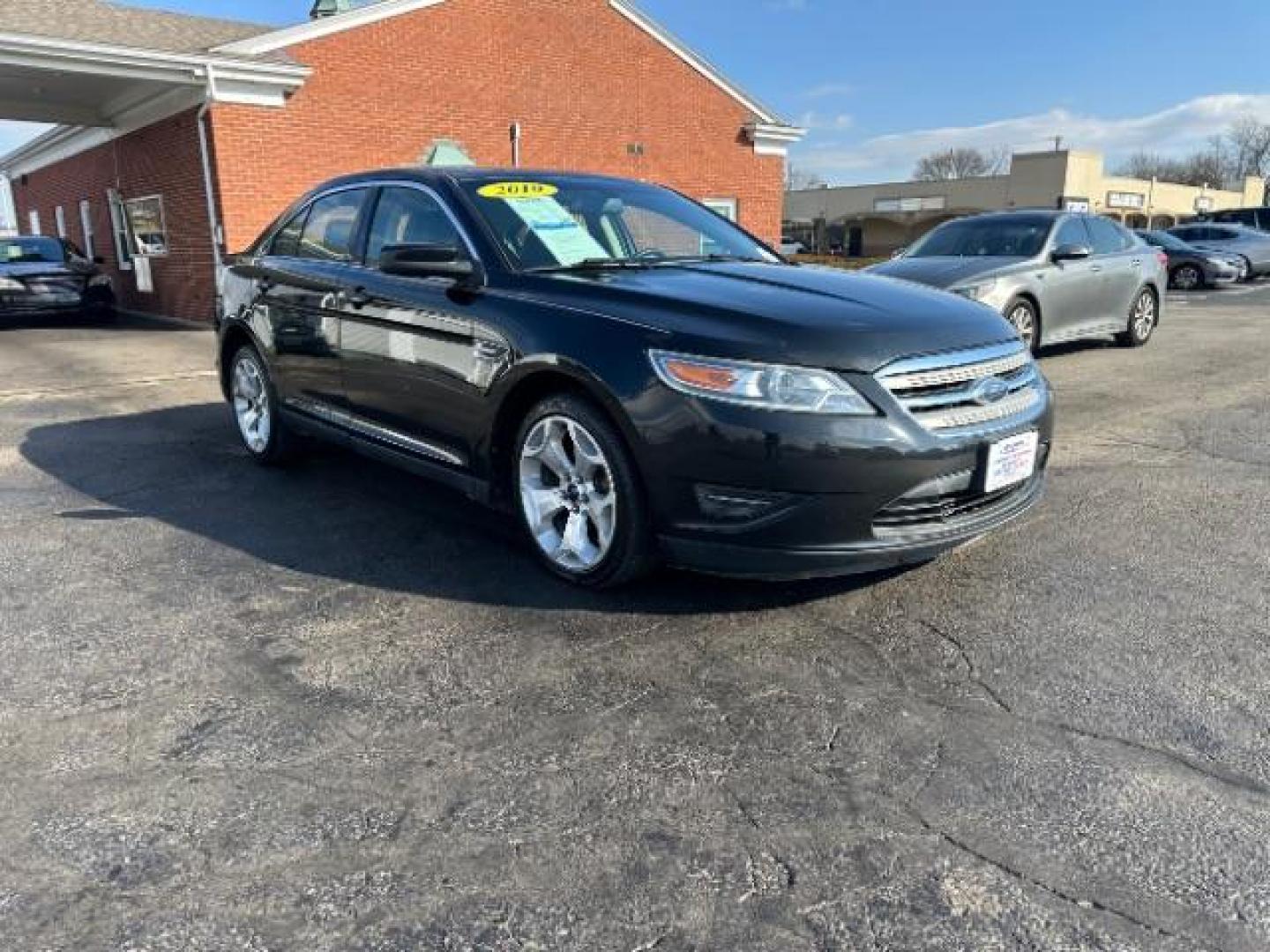 2010 Tuxedo Black Metallic Ford Taurus SEL FWD (1FAHP2EW5AG) with an 3.5L V6 DOHC 24V engine, 6-Speed Automatic transmission, located at 1099 N County Rd 25A , Troy, OH, 45373, (937) 908-9800, 40.057079, -84.212883 - Photo#0