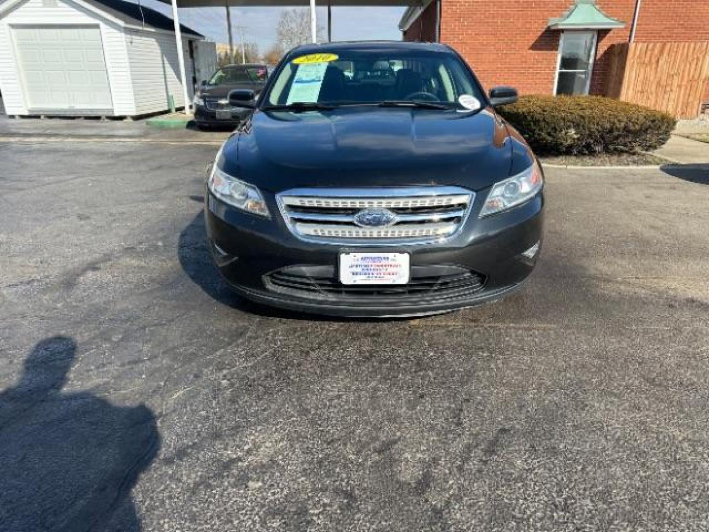 2010 Tuxedo Black Metallic Ford Taurus SEL FWD (1FAHP2EW5AG) with an 3.5L V6 DOHC 24V engine, 6-Speed Automatic transmission, located at 1099 N County Rd 25A , Troy, OH, 45373, (937) 908-9800, 40.057079, -84.212883 - Photo#1