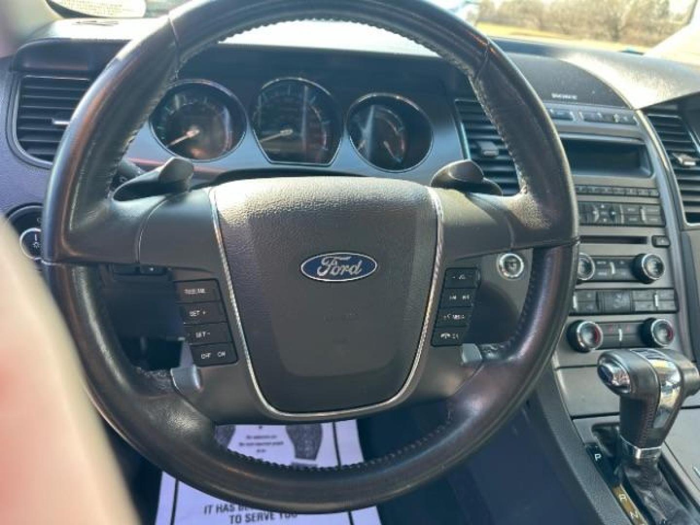 2010 Tuxedo Black Metallic Ford Taurus SEL FWD (1FAHP2EW5AG) with an 3.5L V6 DOHC 24V engine, 6-Speed Automatic transmission, located at 1099 N County Rd 25A , Troy, OH, 45373, (937) 908-9800, 40.057079, -84.212883 - Photo#7