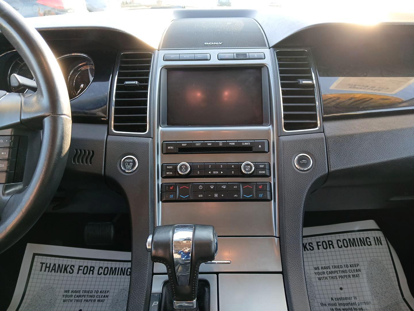 2010 Ford Taurus Limited FWD (1FAHP2FW4AG) with an 3.5L V6 DOHC 24V engine, 6-Speed Automatic transmission, located at 8750 N County Rd 25A, Piqua, OH, 45356, (937) 908-9800, 40.164391, -84.232513 - 2010 Ford Taurus Limited FWD - Photo#12