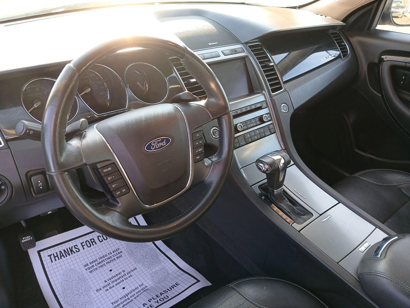 2010 Ford Taurus Limited FWD (1FAHP2FW4AG) with an 3.5L V6 DOHC 24V engine, 6-Speed Automatic transmission, located at 8750 N County Rd 25A, Piqua, OH, 45356, (937) 908-9800, 40.164391, -84.232513 - 2010 Ford Taurus Limited FWD - Photo#8