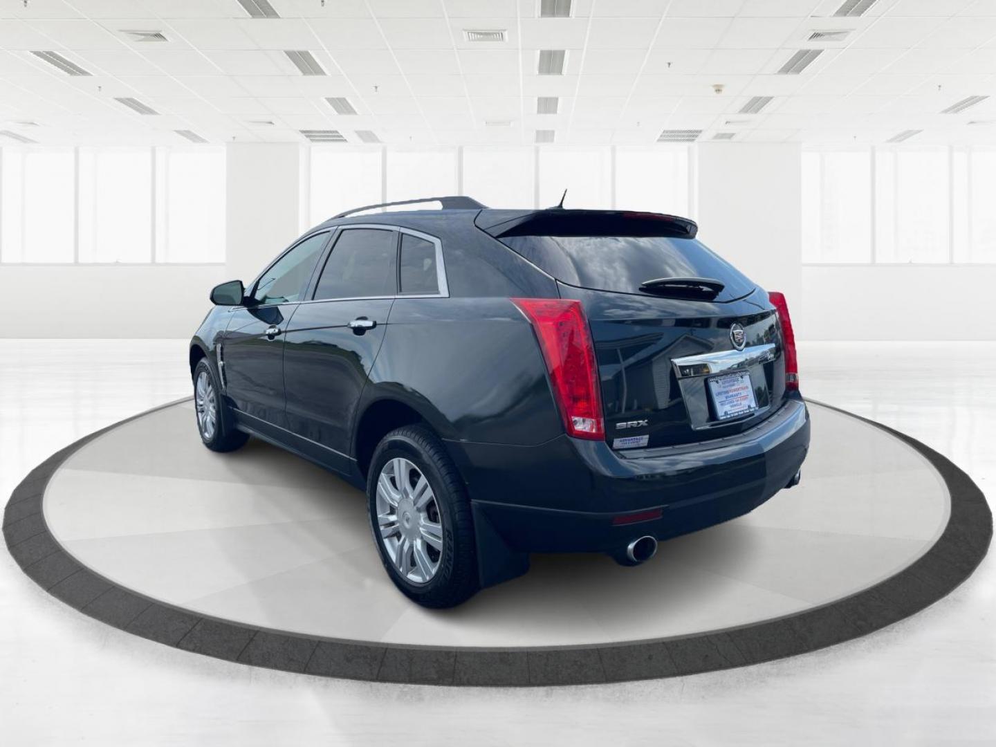 2011 Black Raven Cadillac SRX (3GYFNGEY5BS) with an 3.0L V6 DOHC 24V engine, 6-Speed Automatic transmission, located at 401 Woodman Dr, Riverside, OH, 45431, (937) 908-9800, 39.760899, -84.123421 - Photo#4