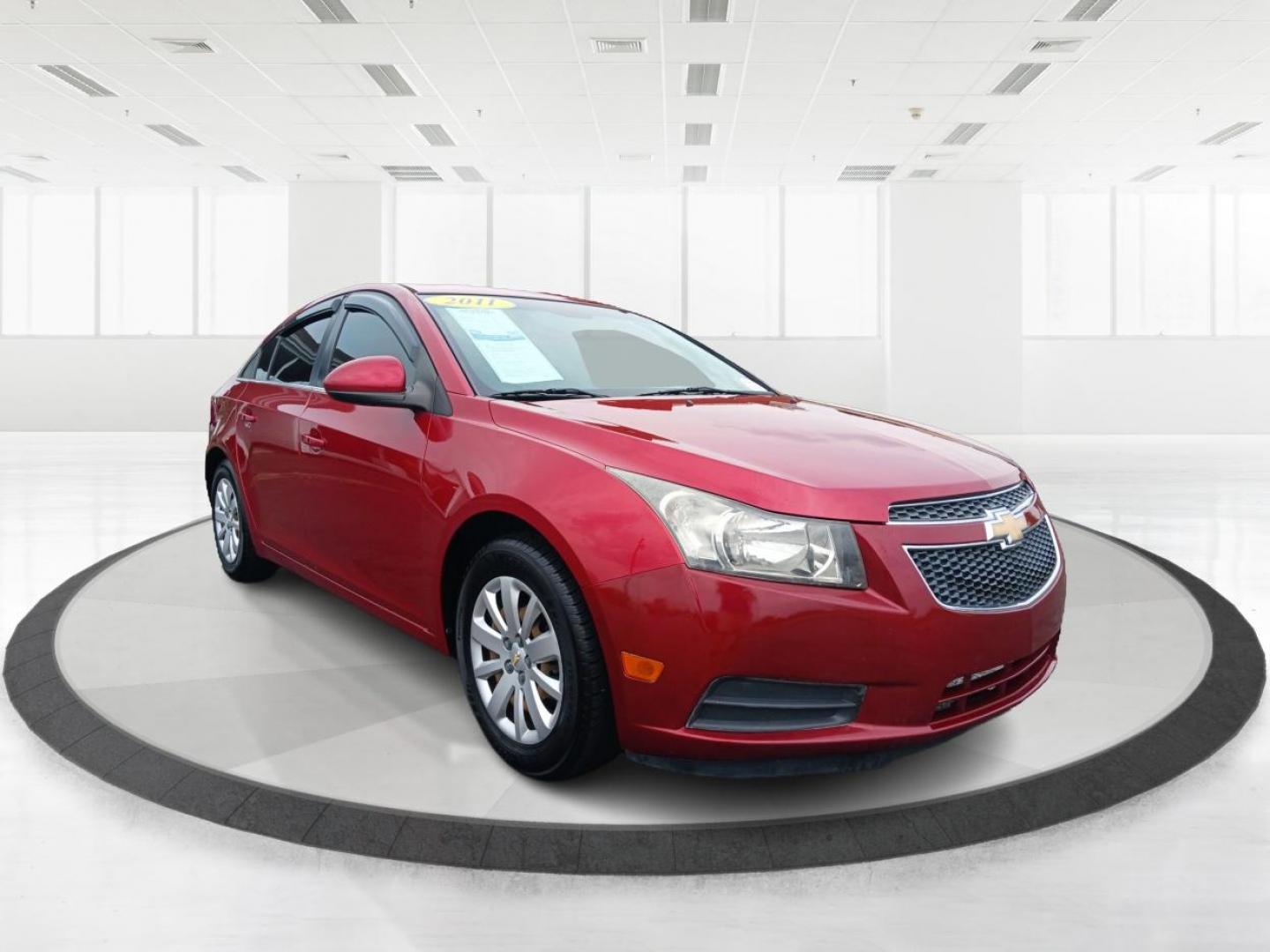 2011 Crystal Red Metallic Chevrolet Cruze 1LT (1G1PF5S93B7) with an 1.4L L4 DOHC 16V TURBO engine, 6-Speed Manual transmission, located at 880 E. National Road, Vandalia, OH, 45377, (937) 908-9800, 39.891918, -84.183594 - Photo#0