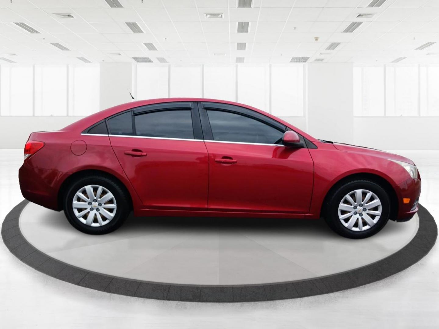 2011 Crystal Red Metallic Chevrolet Cruze 1LT (1G1PF5S93B7) with an 1.4L L4 DOHC 16V TURBO engine, 6-Speed Manual transmission, located at 880 E. National Road, Vandalia, OH, 45377, (937) 908-9800, 39.891918, -84.183594 - Photo#1