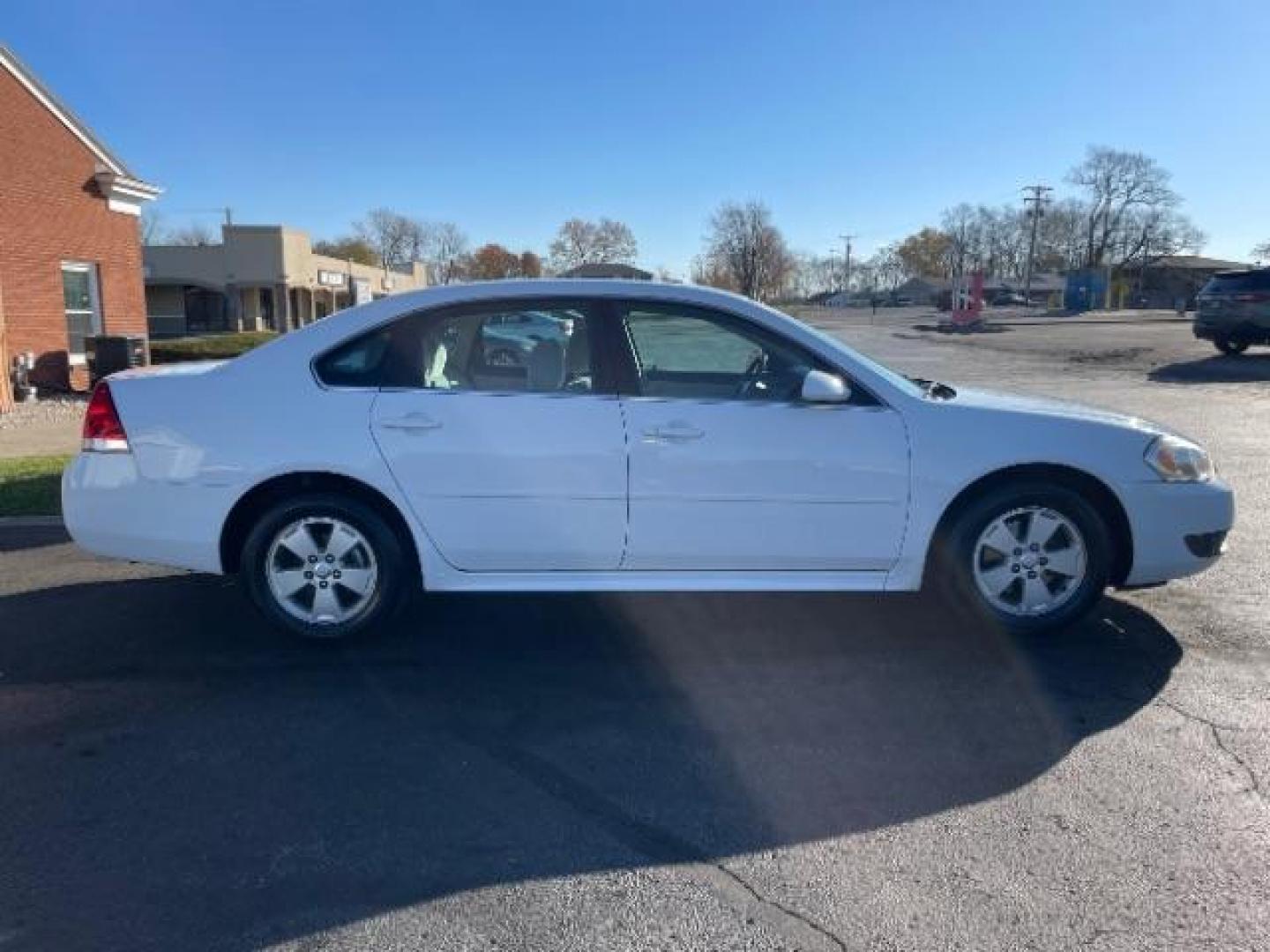 2011 Summit White Chevrolet Impala LT (2G1WG5EK0B1) with an 3.5L V6 OHV 16V FFV engine, 4-Speed Automatic transmission, located at 880 E. National Road, Vandalia, OH, 45377, (937) 908-9800, 39.891918, -84.183594 - Photo#2