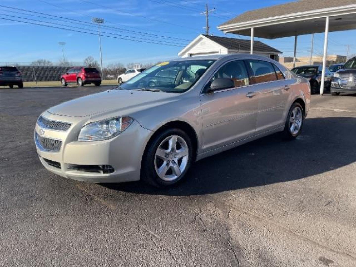 2011 Gold Chevrolet Malibu Fleet (1G1ZA5E17BF) with an 2.4L L4 DOHC 16V engine, 6-Speed Automatic transmission, located at 1184 Kauffman Ave, Fairborn, OH, 45324, (937) 908-9800, 39.807072, -84.030914 - Photo#1