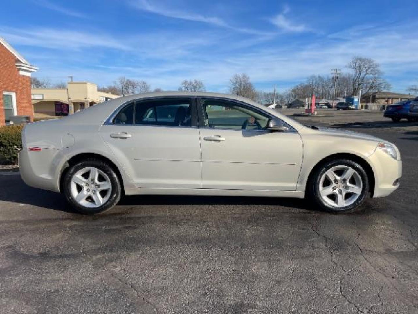 2011 Gold Chevrolet Malibu Fleet (1G1ZA5E17BF) with an 2.4L L4 DOHC 16V engine, 6-Speed Automatic transmission, located at 1184 Kauffman Ave, Fairborn, OH, 45324, (937) 908-9800, 39.807072, -84.030914 - Photo#4