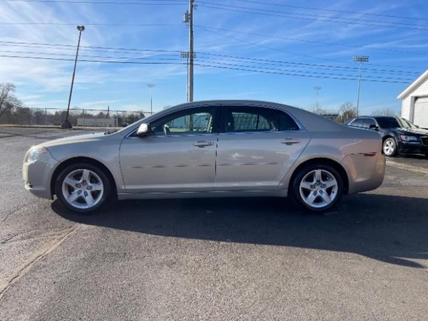 2011 Gold Chevrolet Malibu Fleet (1G1ZA5E17BF) with an 2.4L L4 DOHC 16V engine, 6-Speed Automatic transmission, located at 1184 Kauffman Ave, Fairborn, OH, 45324, (937) 908-9800, 39.807072, -84.030914 - Photo#5