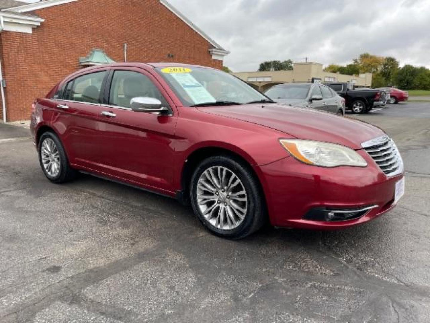 2011 Deep Cherry Red Crystal Pearl Chrysler 200 Limited (1C3BC2FG4BN) with an 3.6L V6 DOHC 24V FFV engine, 6-Speed Automatic transmission, located at 1230 East Main St, Xenia, OH, 45385, (937) 908-9800, 39.688026, -83.910172 - Photo#0