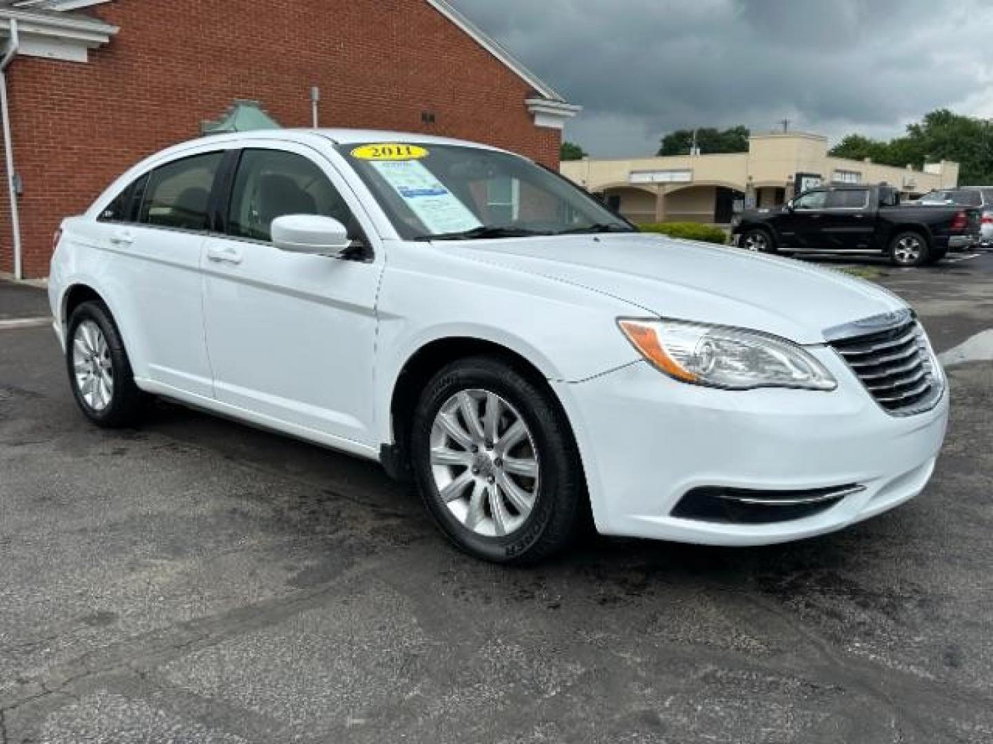 2011 White Gold Chrysler 200 Touring (1C3BC1FB3BN) with an 2.4L L4 DOHC 16V engine, 6-Speed Automatic transmission, located at 880 E. National Road, Vandalia, OH, 45377, (937) 908-9800, 39.891918, -84.183594 - Photo#0