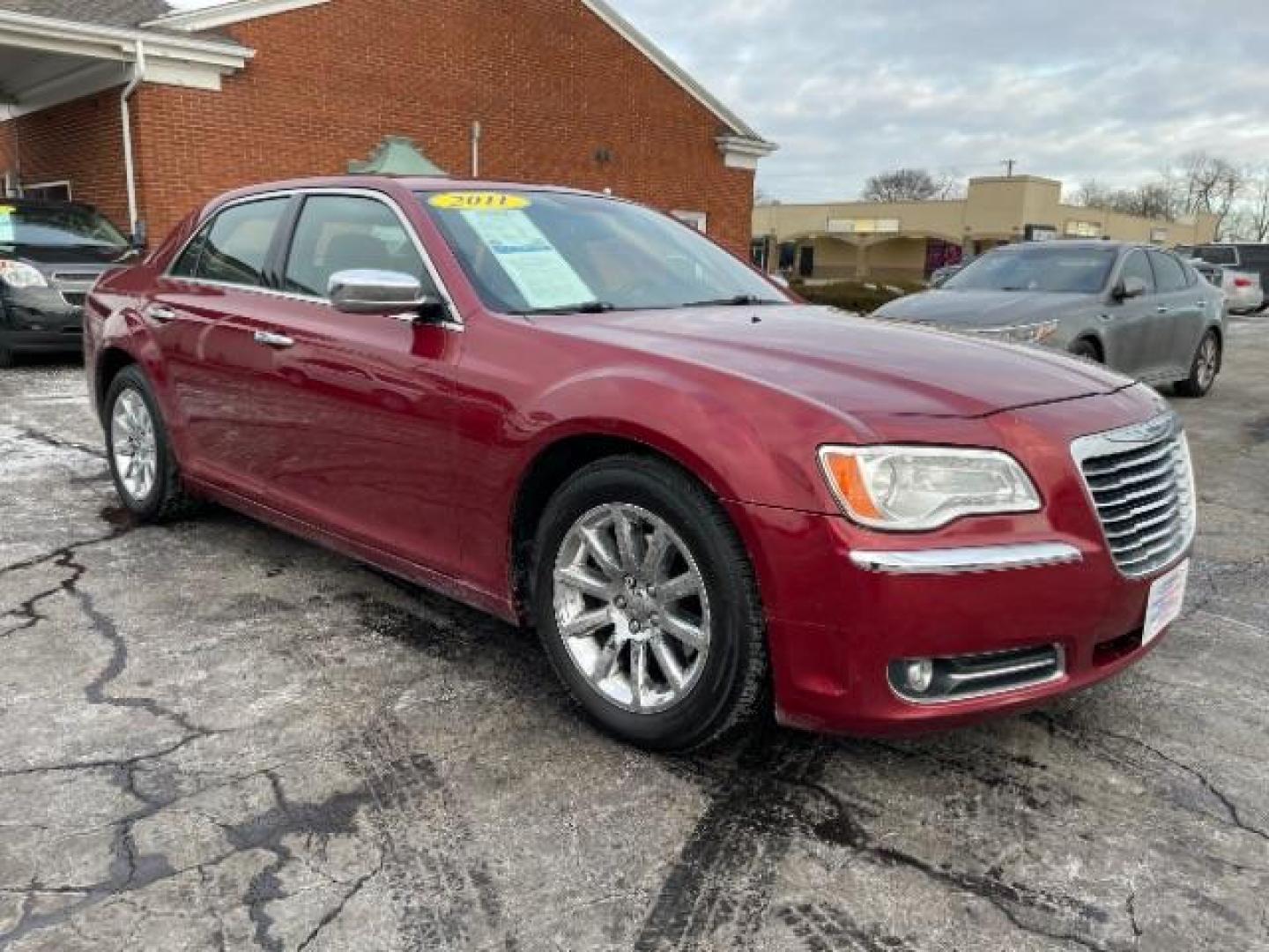 2011 Deep Cherry Red Crystal Pearl Chrysler 300 Limited RWD (2C3CA5CG5BH) with an 3.6L V6 SOHC 24V engine, 5-Speed Automatic transmission, located at 1230 East Main St, Xenia, OH, 45385, (937) 908-9800, 39.688026, -83.910172 - Photo#0