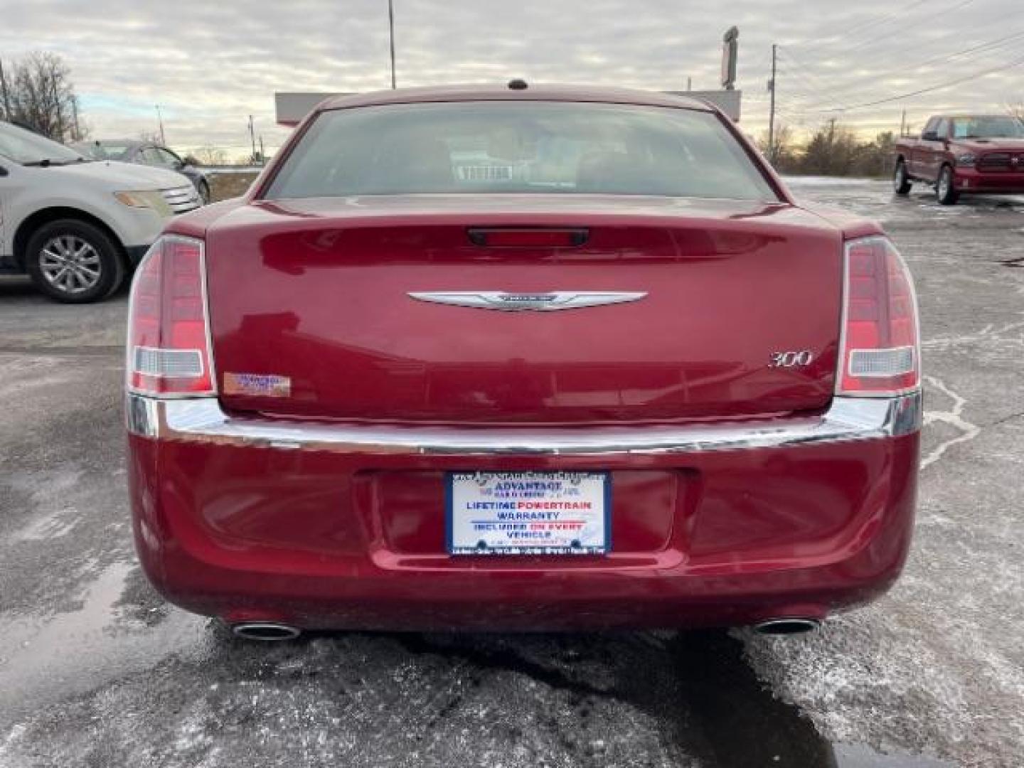 2011 Deep Cherry Red Crystal Pearl Chrysler 300 Limited RWD (2C3CA5CG5BH) with an 3.6L V6 SOHC 24V engine, 5-Speed Automatic transmission, located at 1230 East Main St, Xenia, OH, 45385, (937) 908-9800, 39.688026, -83.910172 - Photo#4