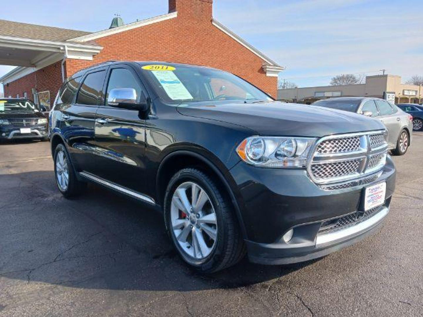 2011 Brilliant Black Crystal Pearl Dodge Durango Crew AWD (1D4SE4GTXBC) with an 5.7L V8 OHV 16V engine, 5-Speed Automatic transmission, located at 1230 East Main St, Xenia, OH, 45385, (937) 908-9800, 39.688026, -83.910172 - Photo#0