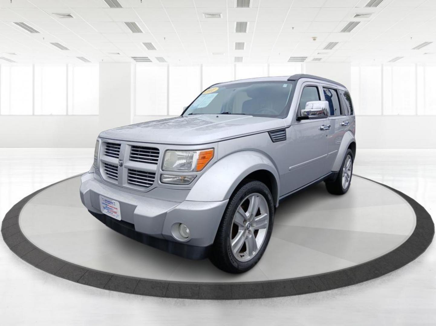 2011 Bright Silver Metallic Dodge Nitro Heat 4WD (1D4PU4GK9BW) with an 3.7L V6 SOHC 12V engine, 4-Speed Automatic transmission, located at 1951 S Dayton Lakeview Rd., New Carlisle, OH, 45344, (937) 908-9800, 39.890999, -84.050255 - Photo#7