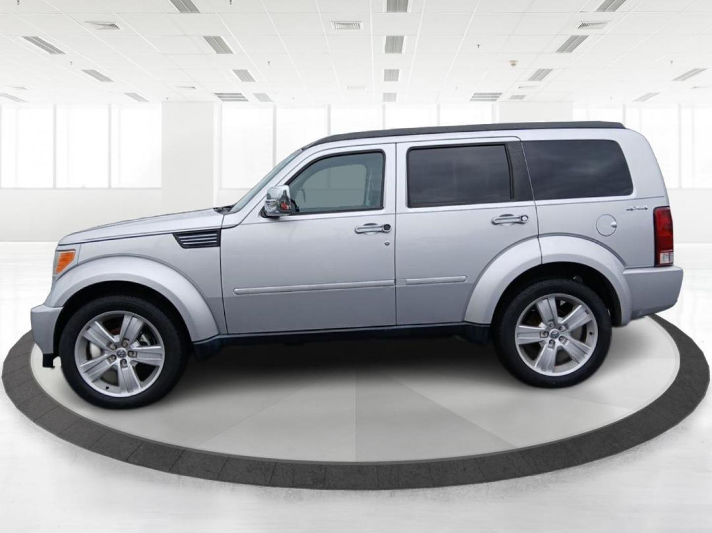 2011 Bright Silver Metallic Dodge Nitro Heat 4WD (1D4PU4GK9BW) with an 3.7L V6 SOHC 12V engine, 4-Speed Automatic transmission, located at 1951 S Dayton Lakeview Rd., New Carlisle, OH, 45344, (937) 908-9800, 39.890999, -84.050255 - Photo#5