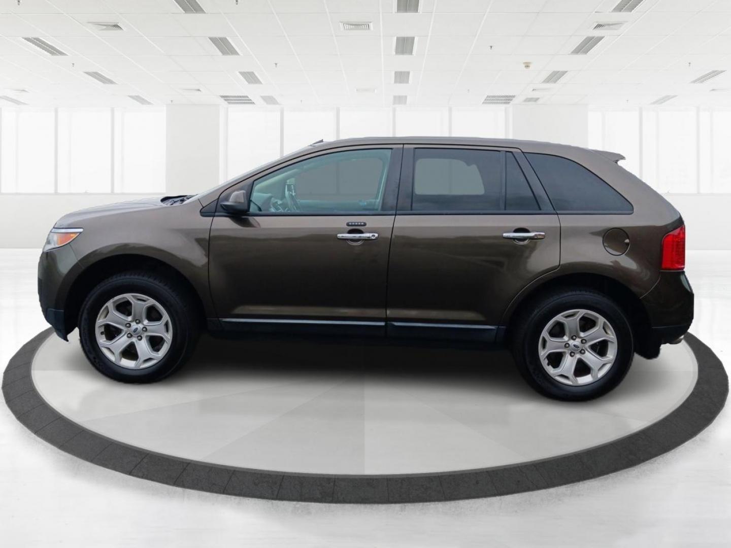 2011 Earth Metallic Ford Edge SEL AWD (2FMDK4JC9BB) with an 3.5L V6 DOHC 24V engine, 6-Speed Automatic transmission, located at 1184 Kauffman Ave, Fairborn, OH, 45324, (937) 908-9800, 39.807072, -84.030914 - Photo#5