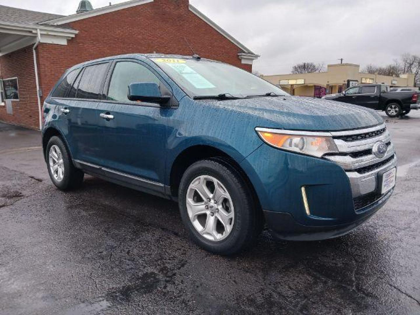 2011 Earth Metallic Ford Edge SEL AWD (2FMDK4JC7BB) with an 3.5L V6 DOHC 24V engine, 6-Speed Automatic transmission, located at 1099 N County Rd 25A , Troy, OH, 45373, (937) 908-9800, 40.057079, -84.212883 - Photo#0