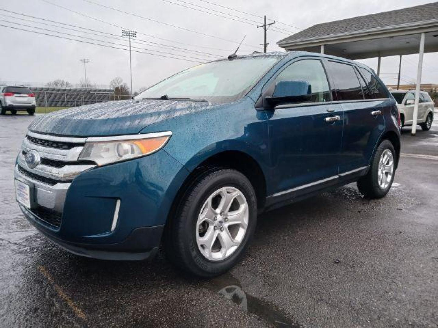 2011 Earth Metallic Ford Edge SEL AWD (2FMDK4JC7BB) with an 3.5L V6 DOHC 24V engine, 6-Speed Automatic transmission, located at 1099 N County Rd 25A , Troy, OH, 45373, (937) 908-9800, 40.057079, -84.212883 - Photo#2