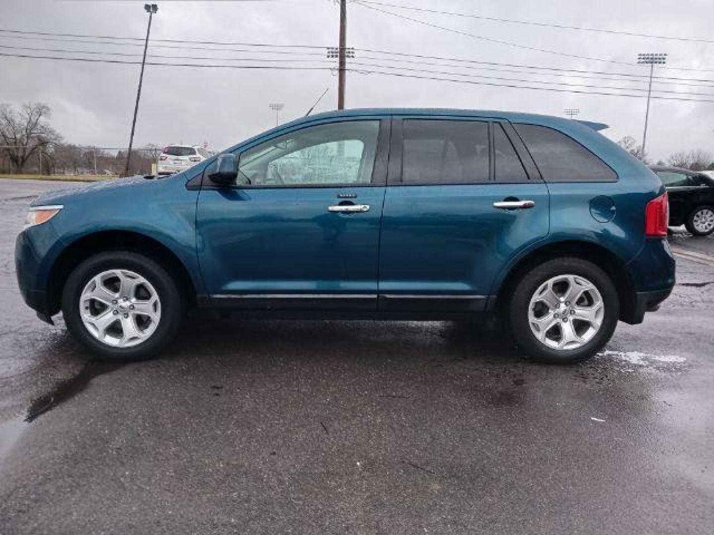 2011 Earth Metallic Ford Edge SEL AWD (2FMDK4JC7BB) with an 3.5L V6 DOHC 24V engine, 6-Speed Automatic transmission, located at 1099 N County Rd 25A , Troy, OH, 45373, (937) 908-9800, 40.057079, -84.212883 - Photo#3