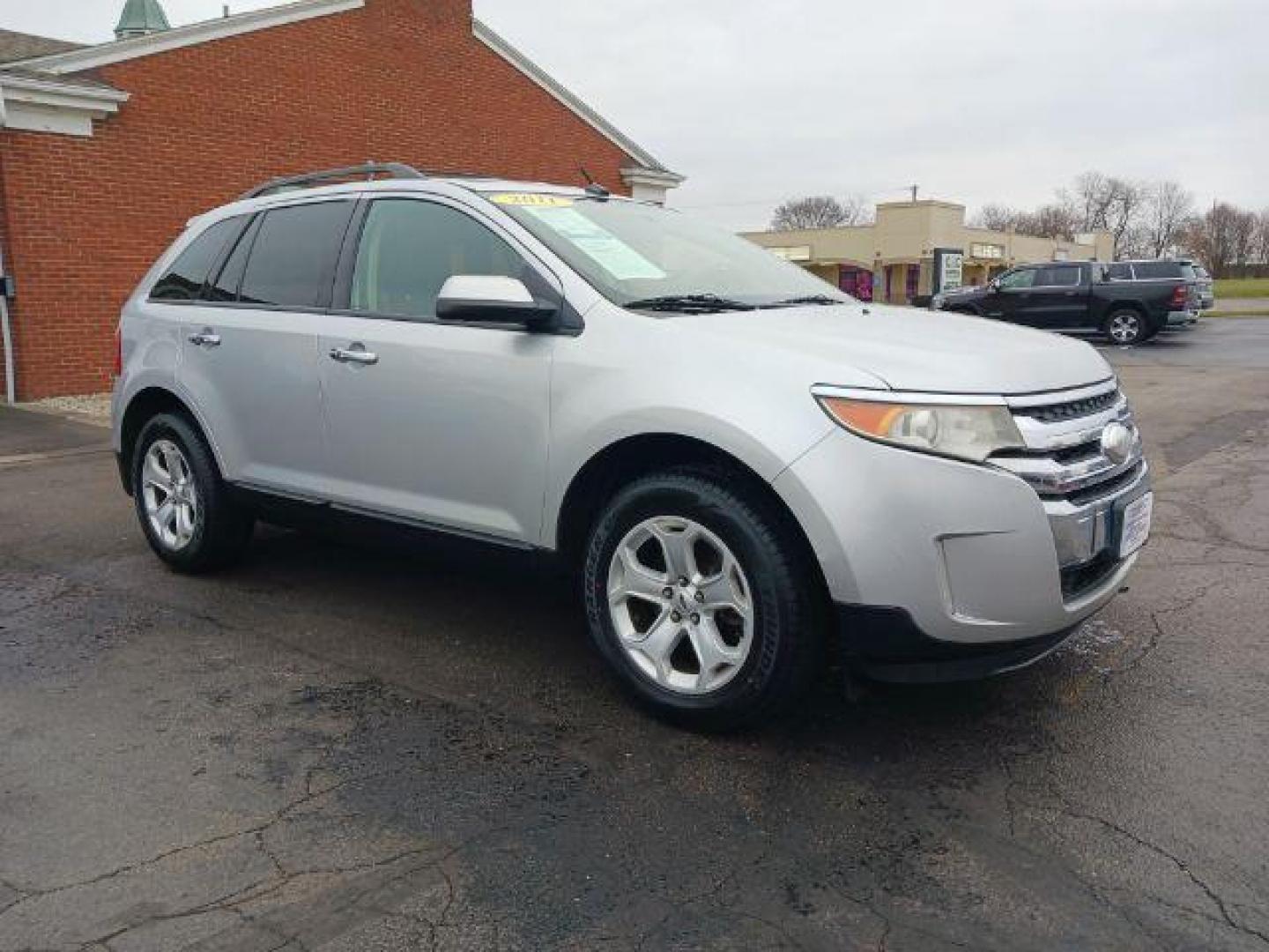 2011 Ingot Silver Metallic Ford Edge SEL FWD (2FMDK3JC8BB) with an 3.5L V6 DOHC 24V engine, 6-Speed Automatic transmission, located at 1951 S Dayton Lakeview Rd., New Carlisle, OH, 45344, (937) 908-9800, 39.890999, -84.050255 - Photo#0