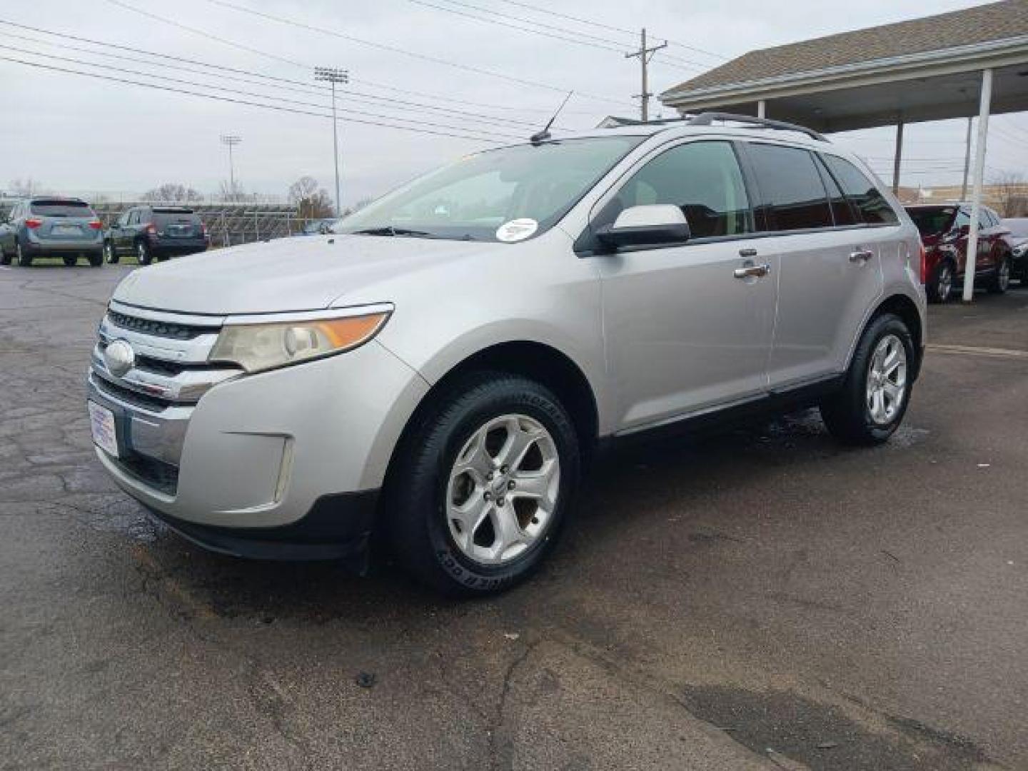 2011 Ingot Silver Metallic Ford Edge SEL FWD (2FMDK3JC8BB) with an 3.5L V6 DOHC 24V engine, 6-Speed Automatic transmission, located at 1951 S Dayton Lakeview Rd., New Carlisle, OH, 45344, (937) 908-9800, 39.890999, -84.050255 - Photo#2