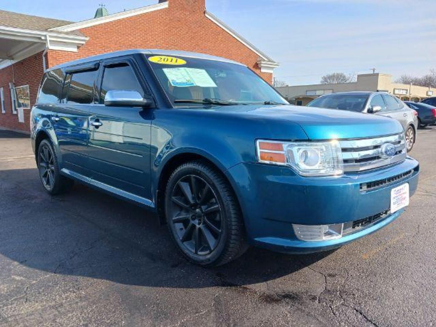 2011 Earth Metallic Ford Flex Limited AWD (2FMHK6DC9BB) with an 3.5L V6 DOHC 24V engine, 6-Speed Automatic Overdrive transmission, located at 1099 N County Rd 25A , Troy, OH, 45373, (937) 908-9800, 40.057079, -84.212883 - Photo#0