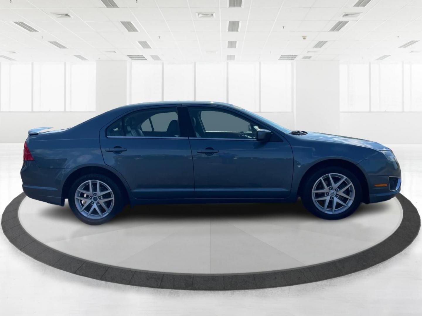 2011 Blue Ford Fusion V6 SEL (3FAHP0JG0BR) with an 3.0L V6 DOHC 24V engine, located at 1184 Kauffman Ave, Fairborn, OH, 45324, (937) 908-9800, 39.807072, -84.030914 - Photo#1