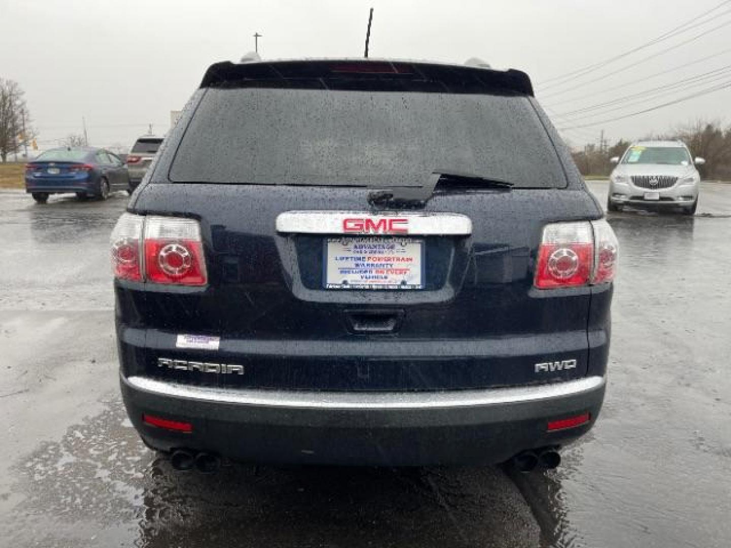 2011 Dark Blue Metallic GMC Acadia SLE-1 AWD (1GKKVNED3BJ) with an 3.6L V6 DOHC 24V engine, 6-Speed Automatic transmission, located at 880 E. National Road, Vandalia, OH, 45377, (937) 908-9800, 39.891918, -84.183594 - Photo#3