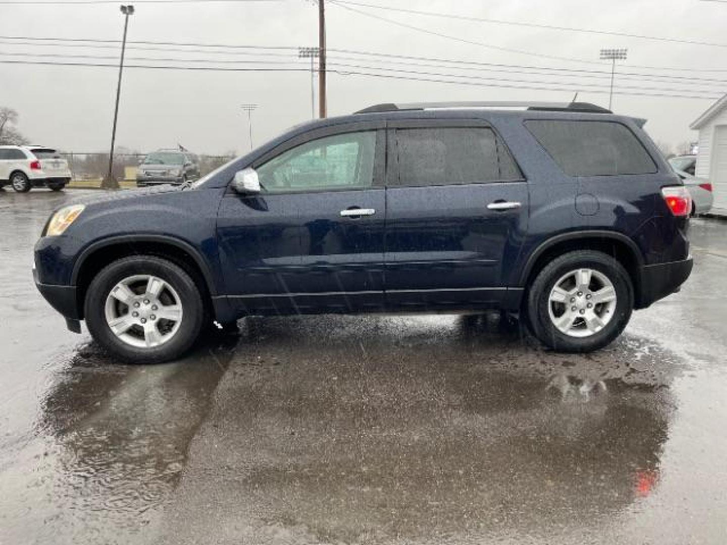 2011 Dark Blue Metallic GMC Acadia SLE-1 AWD (1GKKVNED3BJ) with an 3.6L V6 DOHC 24V engine, 6-Speed Automatic transmission, located at 880 E. National Road, Vandalia, OH, 45377, (937) 908-9800, 39.891918, -84.183594 - Photo#5