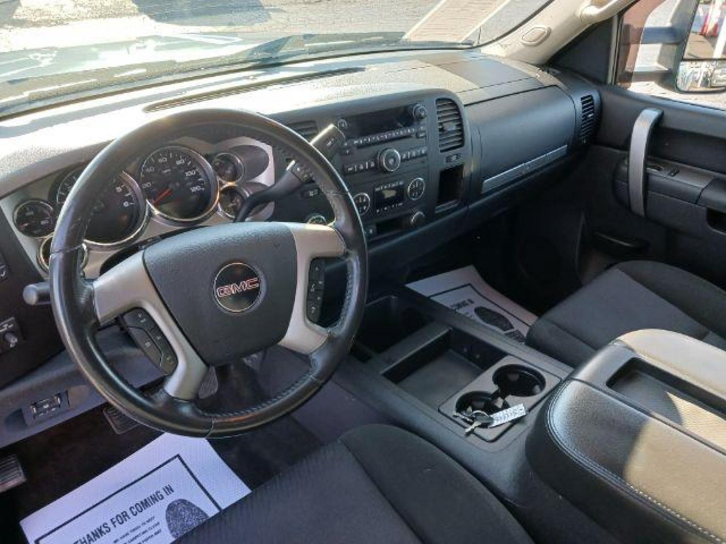 2011 Midnight Blue Metallic GMC Sierra 1500 SLE Ext. Cab 4WD (1GTR2VE32BZ) with an 5.3L V8 OHV 16V FFV engine, 6-Speed Automatic transmission, located at 1184 Kauffman Ave, Fairborn, OH, 45324, (937) 908-9800, 39.807072, -84.030914 - Photo#6