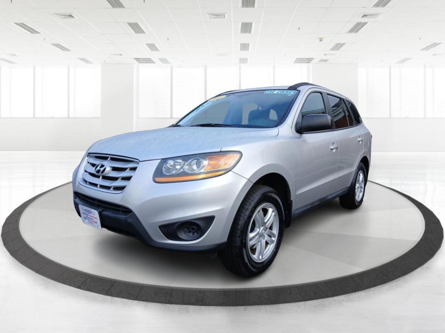 2011 Moonstone Silver Hyundai Santa Fe GL 2.4 4WD (5XYZGDAB1BG) with an 2.4L L4 DOHC 16V engine, 6-Speed Automatic transmission, located at 1099 N County Rd 25A , Troy, OH, 45373, (937) 908-9800, 40.057079, -84.212883 - Photo#7