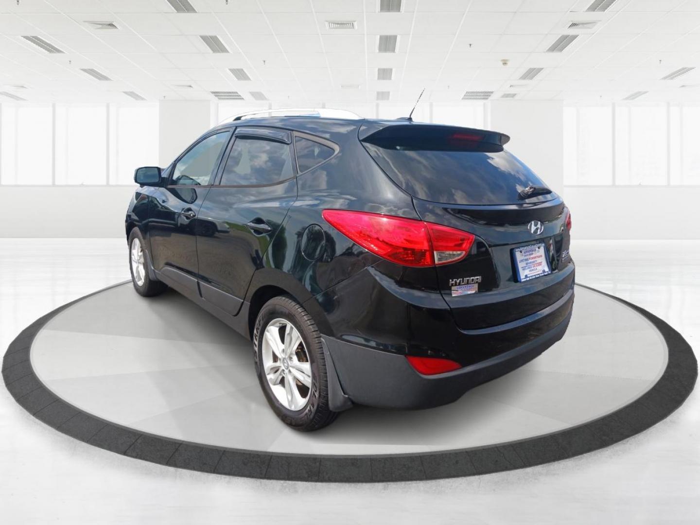 2011 Ash Black Mica Hyundai Tucson (KM8JU3AC8BU) with an 2.4L L4 DOHC 16V engine, 6-Speed Automatic transmission, located at 1099 N County Rd 25A , Troy, OH, 45373, (937) 908-9800, 40.057079, -84.212883 - Photo#4