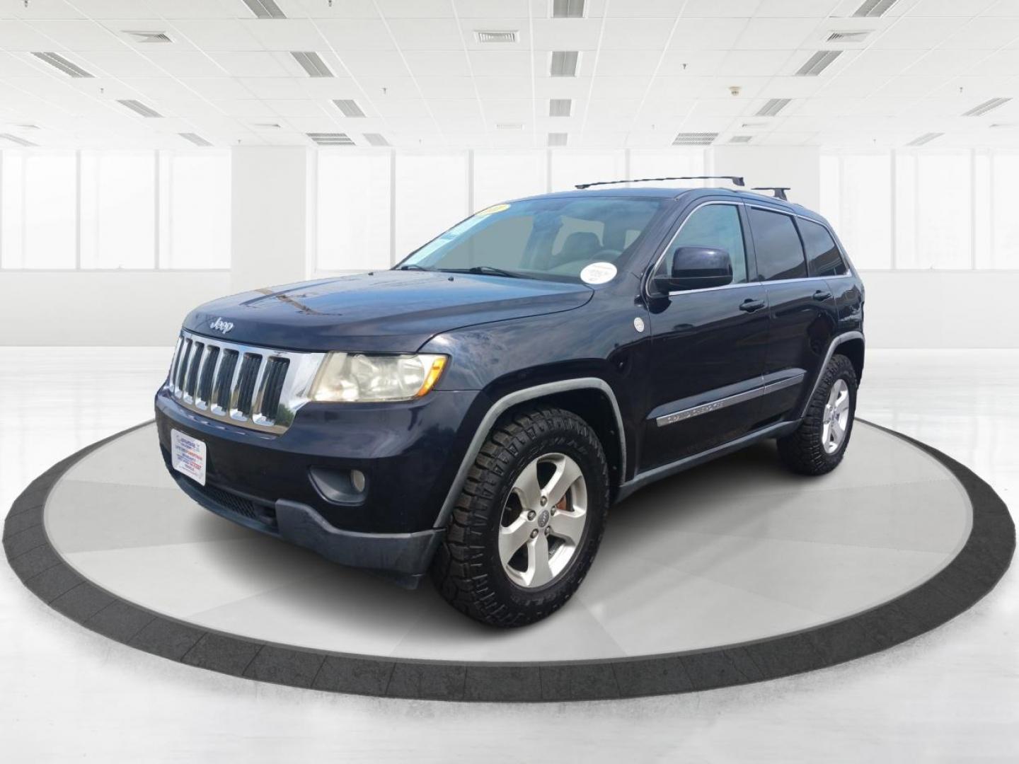 2011 Blue Jeep Grand Cherokee (1J4RR4GT1BC) with an 5.7L V8 OHV 16V engine, 5-Speed Automatic transmission, located at 1184 Kauffman Ave, Fairborn, OH, 45324, (937) 908-9800, 39.807072, -84.030914 - Photo#7