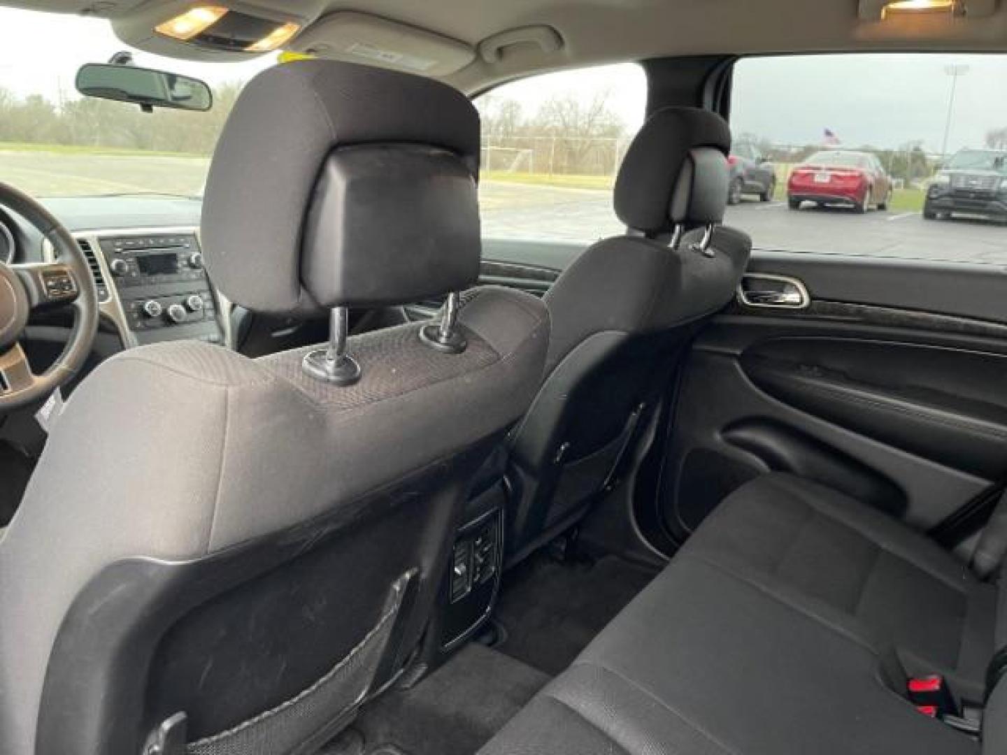 2011 Brilliant Black Crystal Pearl Jeep Grand Cherokee Laredo 4WD (1J4RR4GG4BC) with an 3.6L V6 DOHC 24V engine, 5-Speed Automatic transmission, located at 880 E. National Road, Vandalia, OH, 45377, (937) 908-9800, 39.891918, -84.183594 - Photo#8