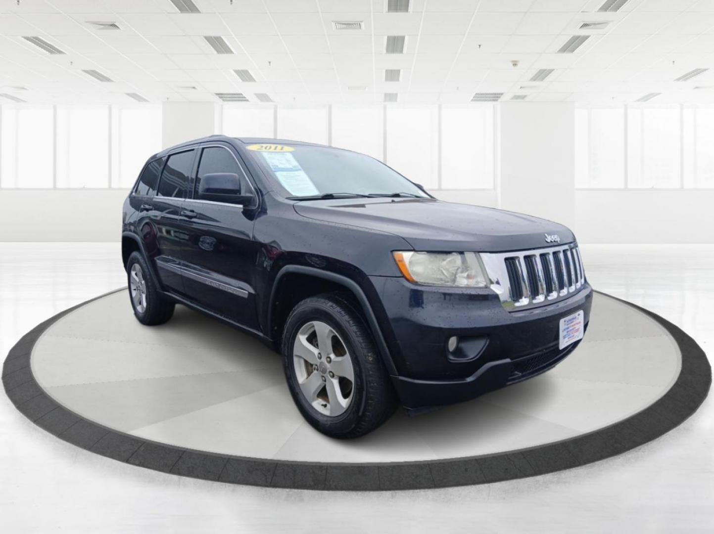 2011 Jeep Grand Cherokee Laredo 4WD (1J4RR4GG9BC) with an 3.6L V6 DOHC 24V engine, 5-Speed Automatic transmission, located at 880 E. National Road, Vandalia, OH, 45377, (937) 908-9800, 39.891918, -84.183594 - 2011 Jeep Grand Cherokee Laredo 4WD - Photo#0