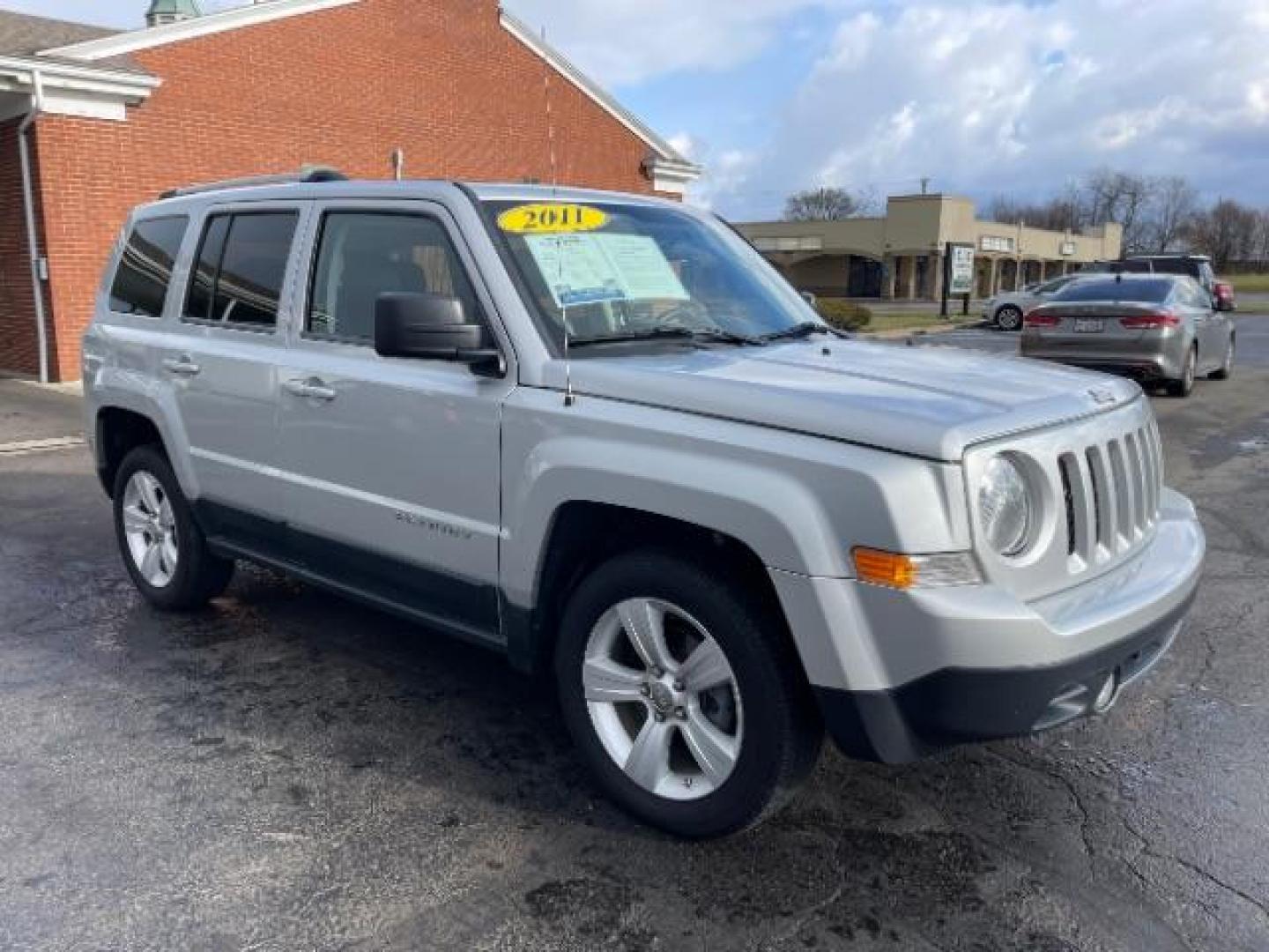 2011 Bright Silver Metallic Jeep Patriot Latitude X 4WD (1J4NF4GB8BD) with an 2.4L L4 DOHC 16V engine, located at 1099 N County Rd 25A , Troy, OH, 45373, (937) 908-9800, 40.057079, -84.212883 - Photo#0